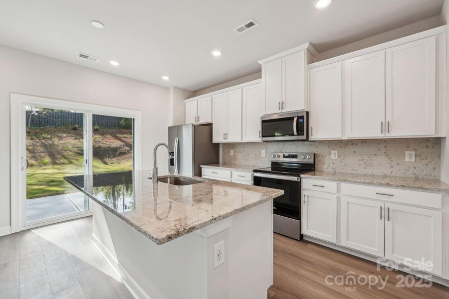 Furnished interior view inside a new home in Walnut Reserve, Conover (Image 5).