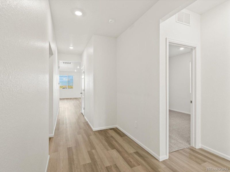 Spacious, unfurnished interior of a new home in Poudre Heights: The Lakes Collection, Windsor (Image 16). Spacious, unfurnished interior of a new home in Poudre Heights: The Lakes Collection, Windsor (Image 16).