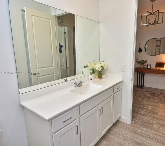 Furnished interior view inside a new home in Central Park, Port St. Lucie (Image 26).