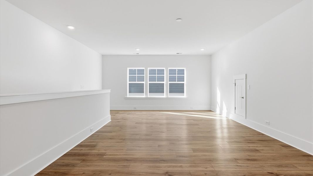 Representative furnished interior of a home built from the Eden by DRB Elevate. in Summerwind Crossing at Lakes of Cane Bay, Summerville (Image 31).