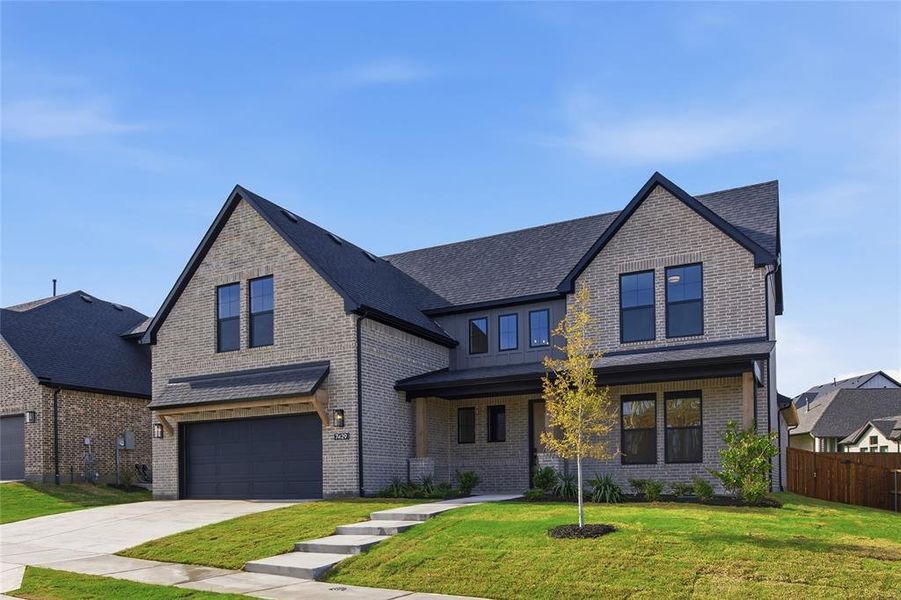 Front exterior of a new home in Talon Hills, Fort Worth, TX, highlighting curb appeal (Image 2). Front exterior of a new home in Talon Hills, Fort Worth, TX, highlighting curb appeal (Image 2).