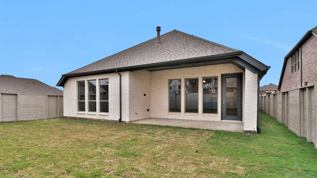 Exterior details and patio area of a home in Legacy, League City (Image 4).