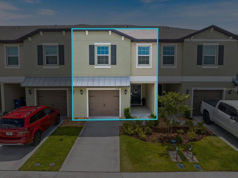 Front exterior of a new home in , Palmetto, FL, highlighting curb appeal (Image 25).