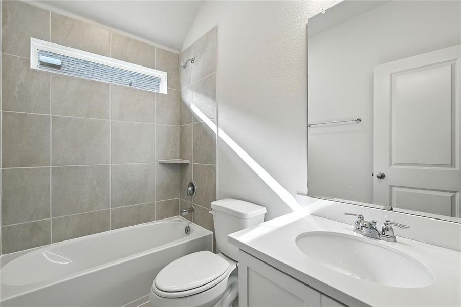 Full bathroom featuring vanity and shower / bathtub combination