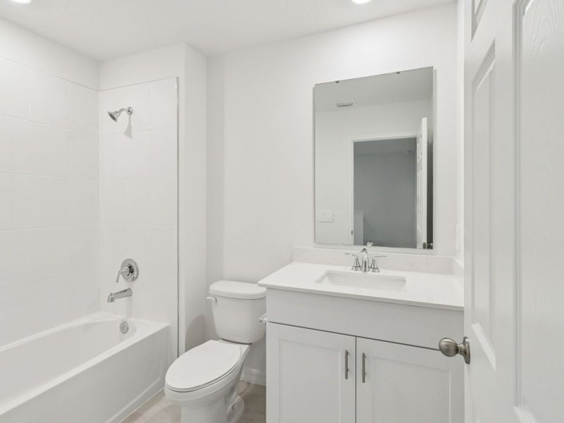Furnished interior view inside a new home in Cagan Crossings West, Clermont (Image 6).