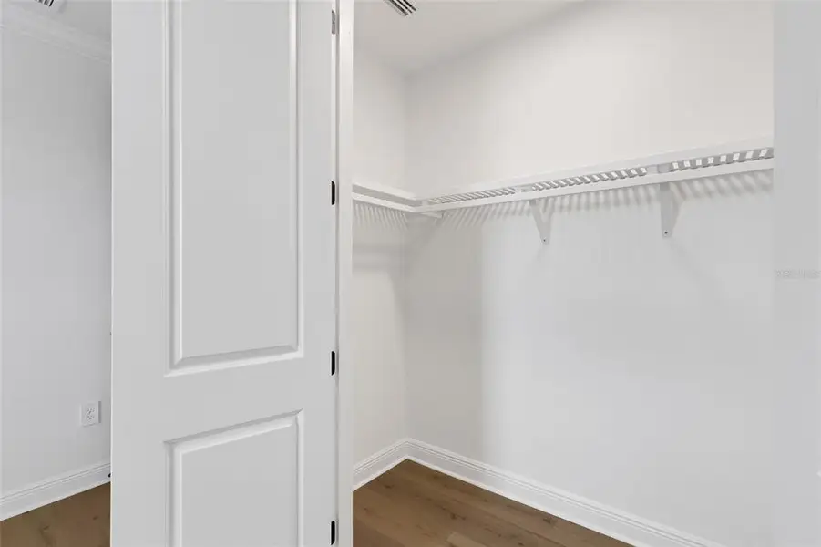 Spacious, unfurnished interior of a new home in Cassata Lakes, Nokomis (Image 75).