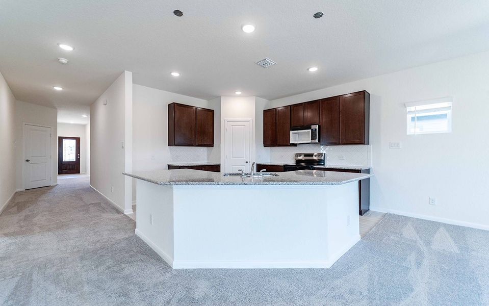 Furnished interior view inside a new home in Hannah Heights, Seguin (Image 6).