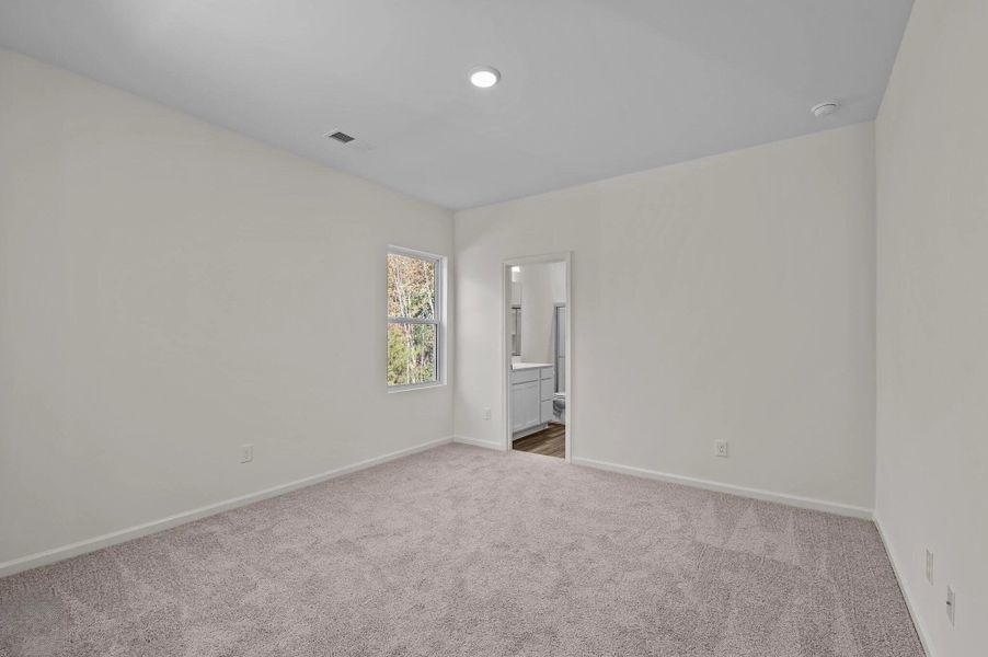 Representative unfurnished interior of a home built from the Falcon by Starlight Homes in Williams Landing, Waller (Image 17).