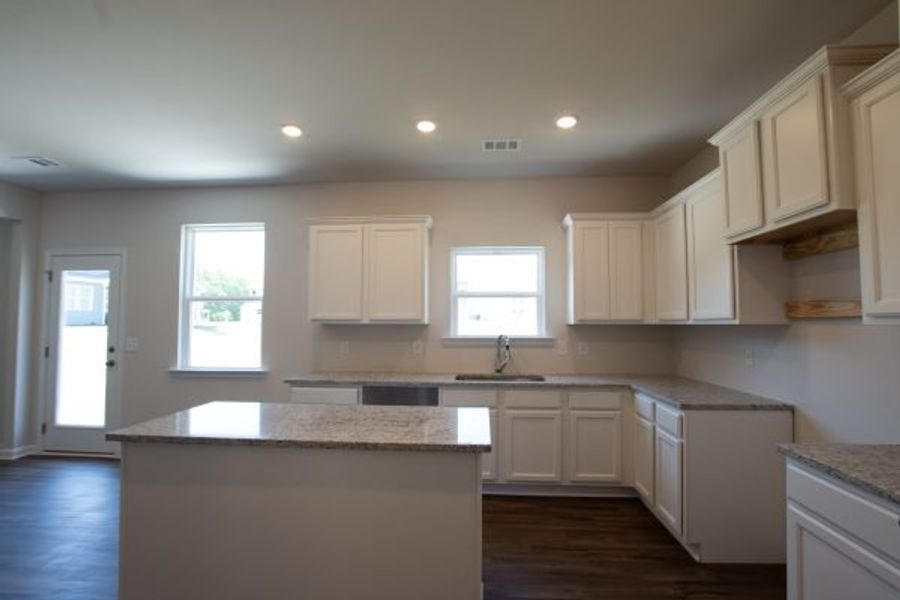 Representative furnished interior of a home built from the Fairfax by Piedmont Residential in Falls Creek, Flowery Branch (Image 5).