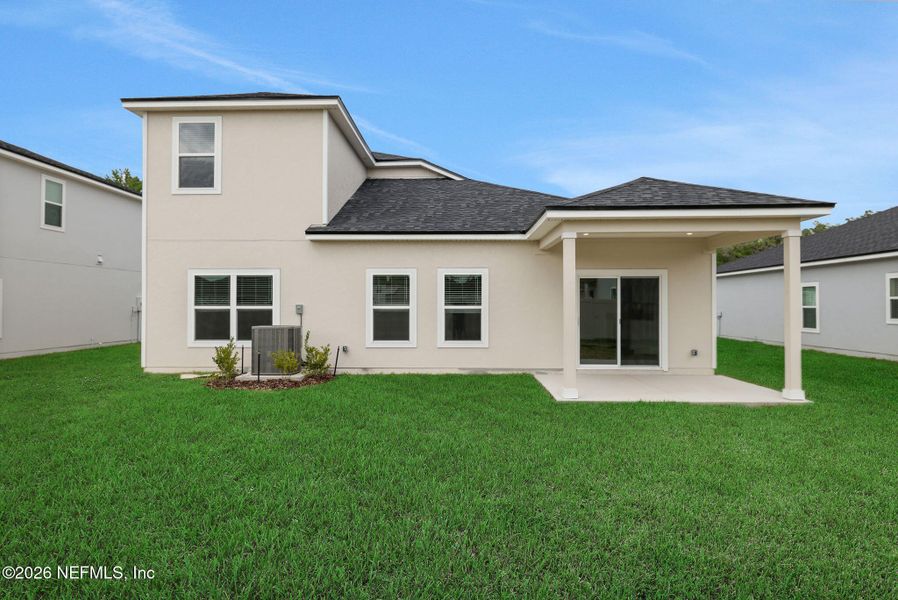 Exterior details and patio area of a home in Wilford Oaks, Orange Park (Image 27).