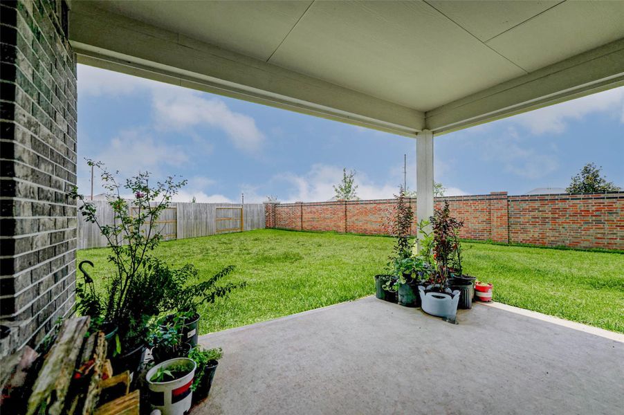 Huge backyard with no rear neighbors and covered patio—ideal for relaxing or entertaining in the Sunterra lifestyle! Huge backyard with no rear neighbors and covered patio—ideal for relaxing or entertaining in the Sunterra lifestyle!