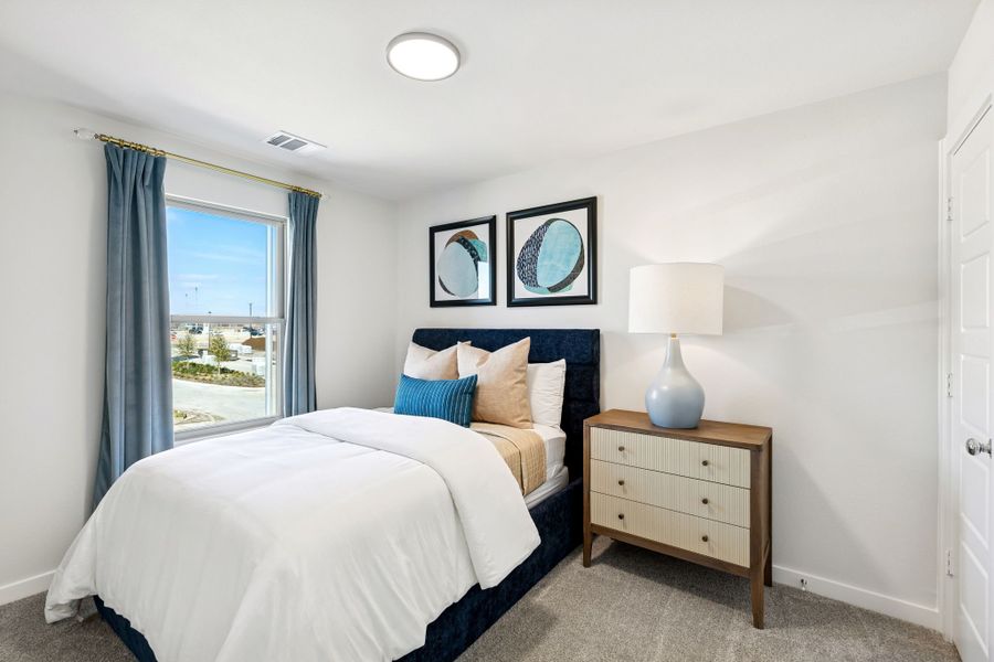 Bedroom in a Nicholson Ranch Magnolia Model Home in Lavon TX by Trophy Signature Homes