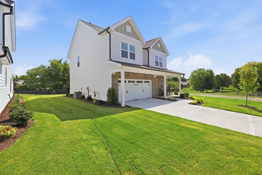 Front exterior of a new home in Golden Gate, High Point, NC, highlighting curb appeal (Image 21).