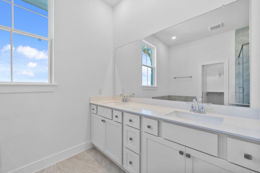 Furnished interior view inside a new home in Bridgeland, Cypress (Image 9).