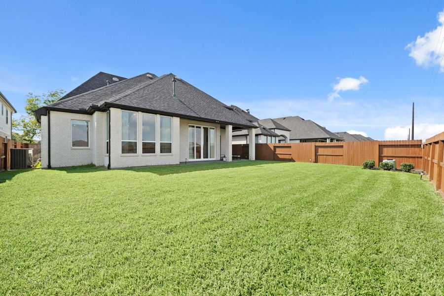 Exterior details and patio area of a home in Sienna, Missouri City (Image 22). Exterior details and patio area of a home in Sienna, Missouri City (Image 22).