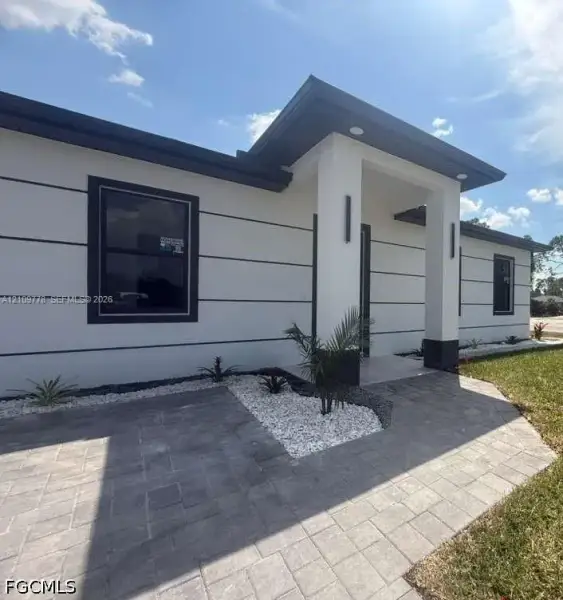 Exterior details and patio area of a home in , Lehigh Acres (Image 19). Exterior details and patio area of a home in , Lehigh Acres (Image 19).