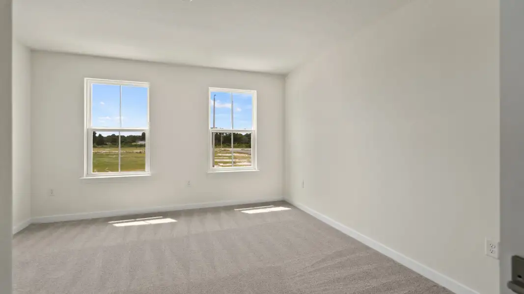 Furnished interior view inside a new home in Willowbrook North, Winter Haven (Image 38).