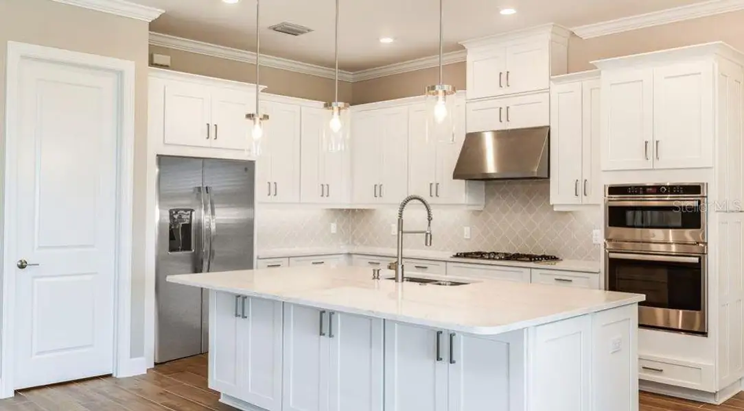 Furnished interior view inside a new home in Esplanade at Westview, Kissimmee (Image 7). Furnished interior view inside a new home in Esplanade at Westview, Kissimmee (Image 7).