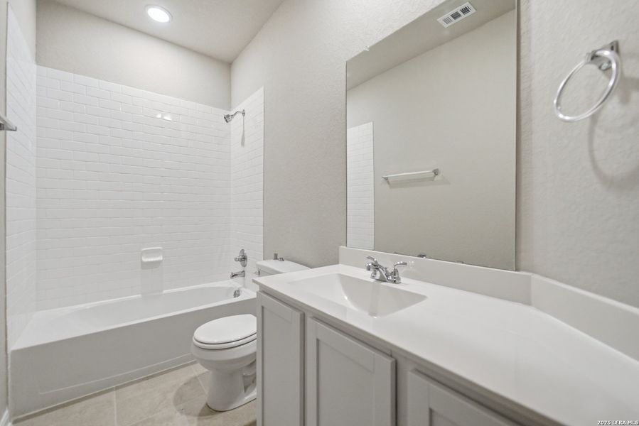 Furnished interior view inside a new home in Hennersby Hollow, San Antonio (Image 5).