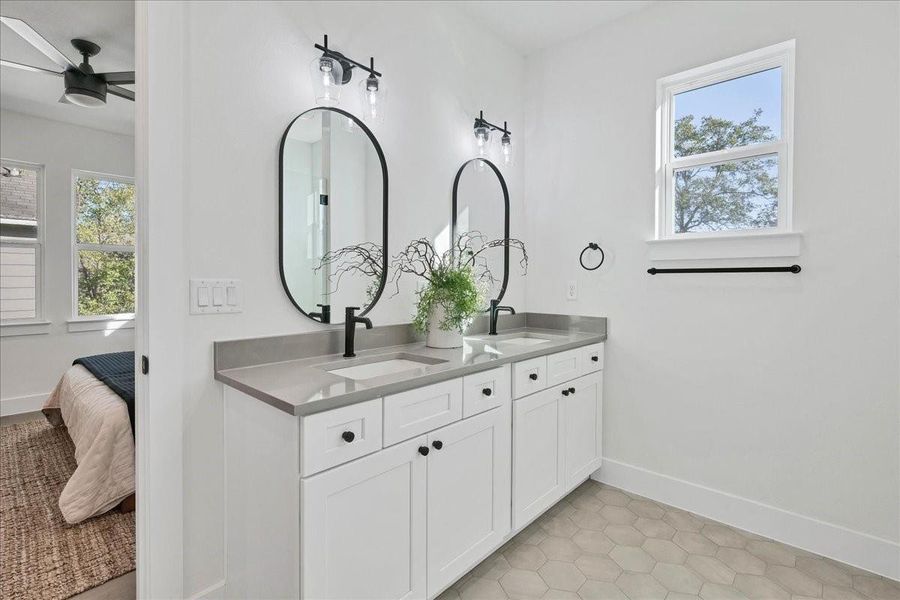 Clean lines and sleek fixtures throughout this bathroom