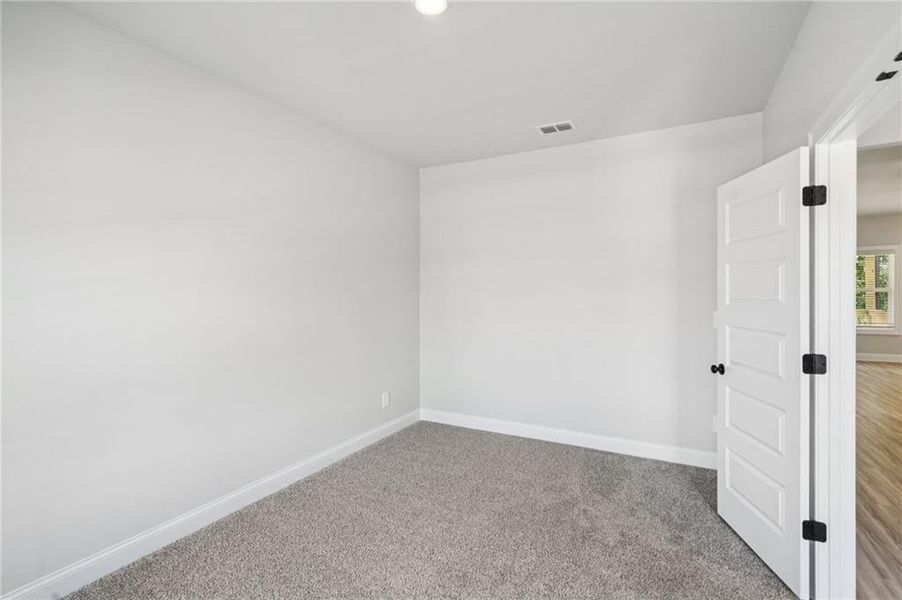 Spacious, unfurnished interior of a new home in Martin Springs - Estate Series, Lawrenceville (Image 27).
