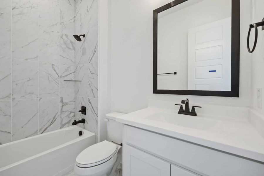 Representative furnished interior of a home built from the Sicily by Chesmar Homes in Lakeway Estates, Waxahachie (Image 7).