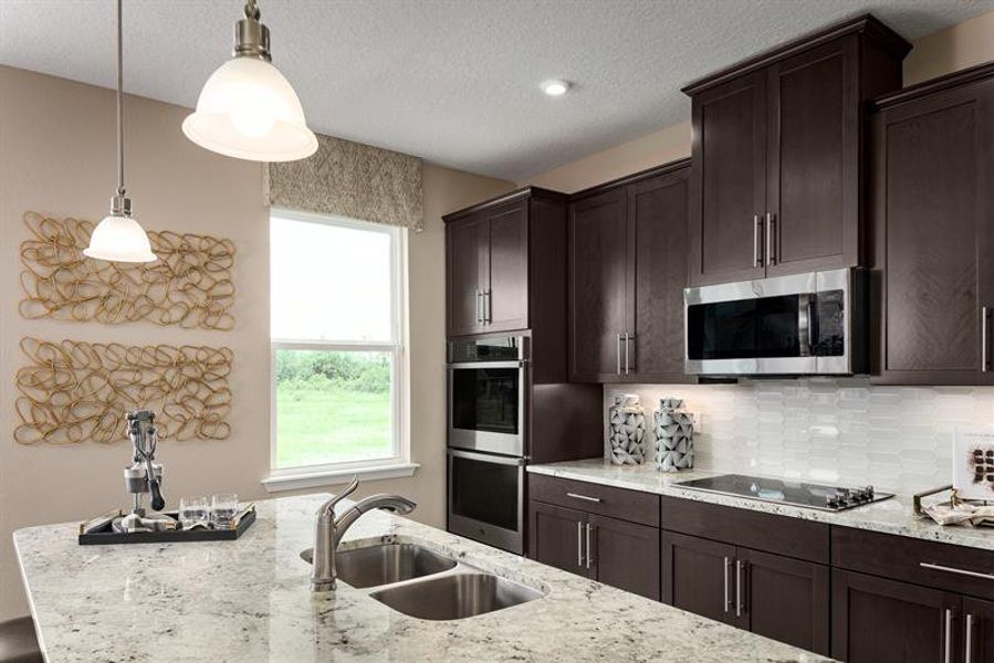 Representative furnished interior of a home built from the Rochelle by Ryan Homes in Bellaviva, Auburndale (Image 2).