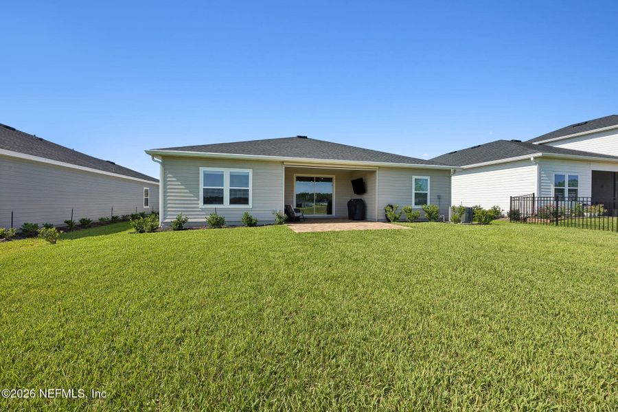 Exterior details and patio area of a home in Edenbrooke at Hyland Trail | 55+, Green Cove Springs (Image 29). Exterior details and patio area of a home in Edenbrooke at Hyland Trail | 55+, Green Cove Springs (Image 29).