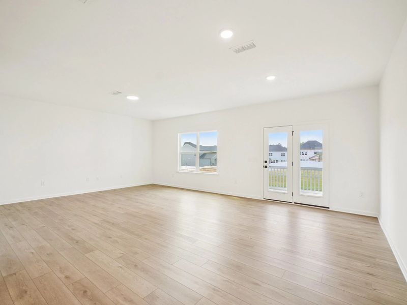 Family Room featuring the AW Collection® Serene - Open space with natural finishes and light.