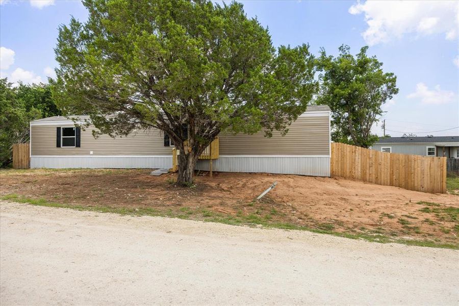 Exterior details and patio area of a home in , Granbury (Image 14).