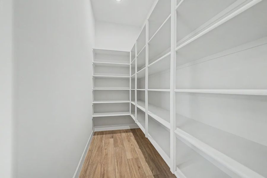 Spacious, unfurnished interior of a new home in Bellero Estates, Queen Creek (Image 22).