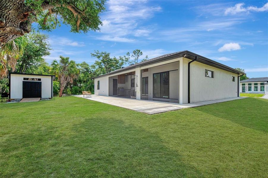 Exterior details and patio area of a home in , North Port (Image 41).
