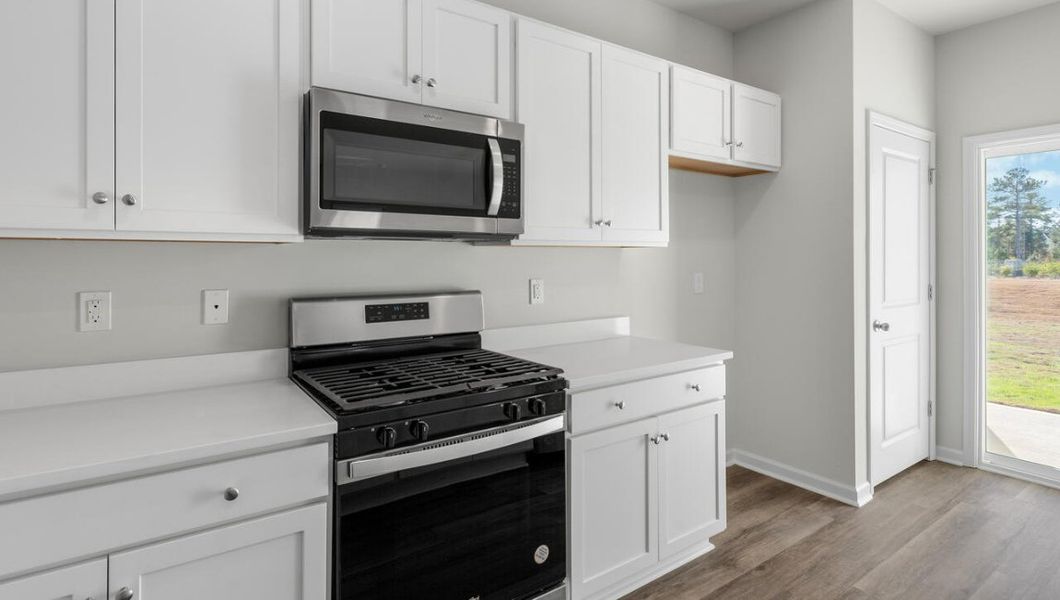 Representative furnished interior of a home built from the KERRY by D.R. Horton in Cedar Hill Landing, Navassa (Image 8).