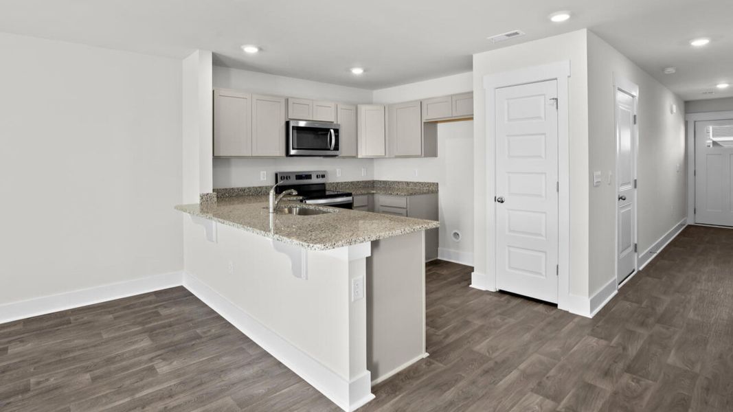 Furnished interior view inside a new home in Indigo Preserve Townhomes, Leland (Image 6).