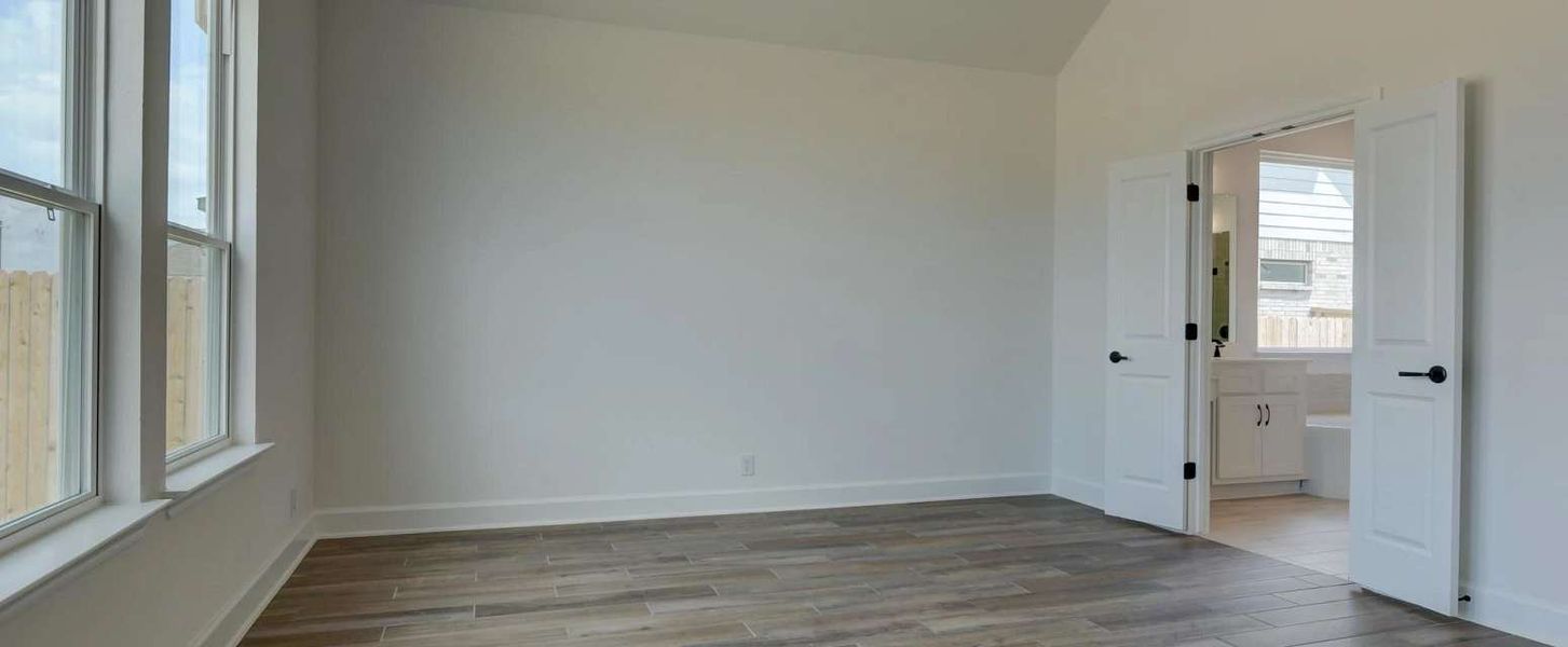 Representative unfurnished interior of a home built from the Ellington by Ashton Woods in Megan's Landing 70's, Castroville (Image 16).