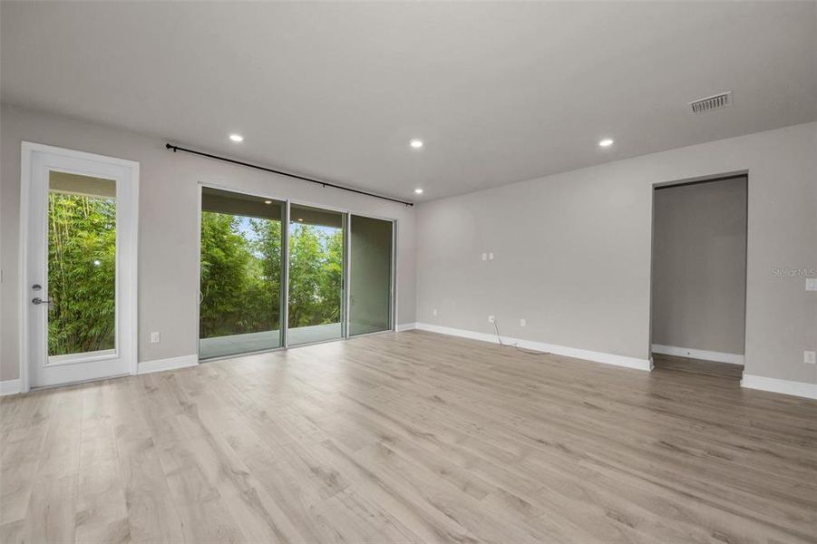 Spacious, unfurnished interior of a new home in Eagle Creek - Garden Series, Tarpon Springs (Image 27).