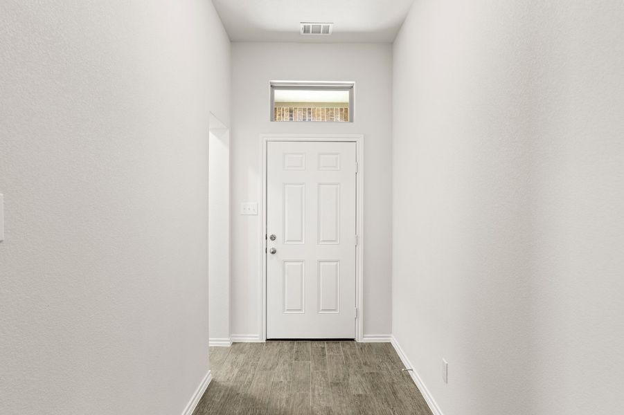 Front exterior of a new home in De Berry Reserve, Royse City, TX, highlighting curb appeal (Image 15).