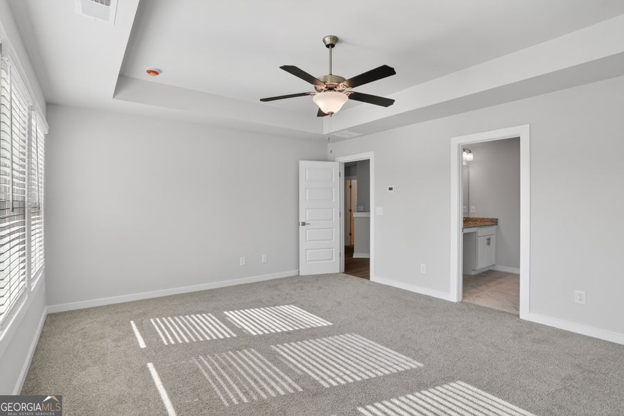 Spacious, unfurnished interior of a new home in The Fairways at Mirror Lake, Villa Rica (Image 58).