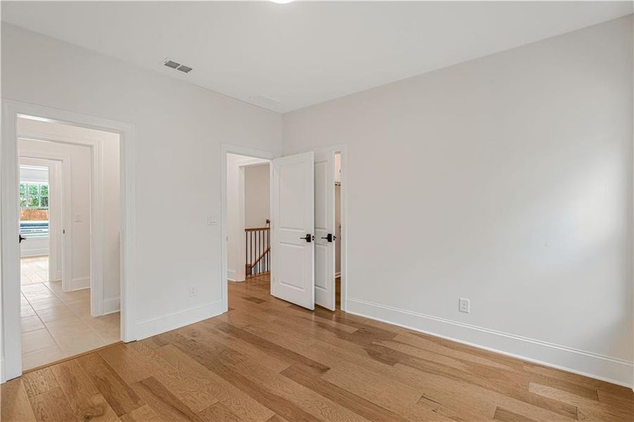 Spacious, unfurnished interior of a new home in Bellwyn, Johns Creek (Image 57).