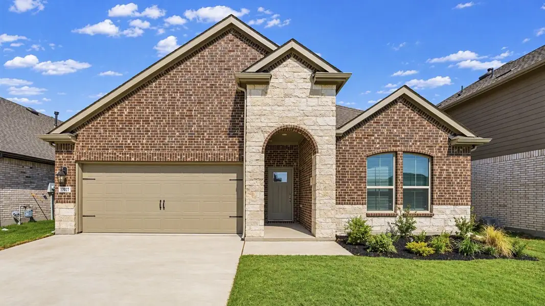 Front exterior of a new home in Silverado, Aubrey, TX, highlighting curb appeal (Image 1). Front exterior of a new home in Silverado, Aubrey, TX, highlighting curb appeal (Image 1).