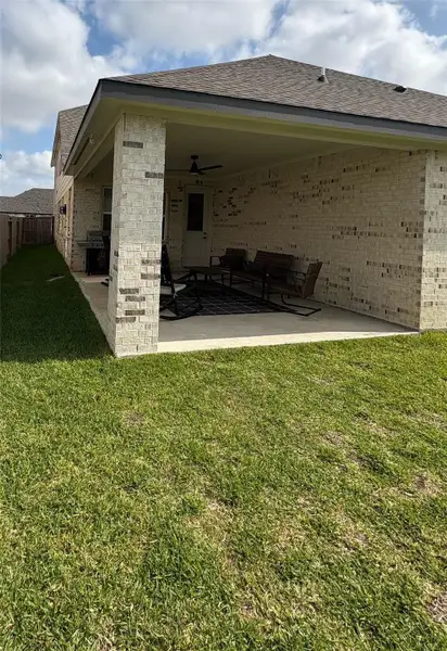 Front exterior of a new home in , Cypress, TX, highlighting curb appeal (Image 1).