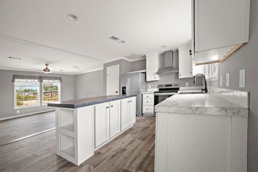 Furnished interior view inside a new home in , Okeechobee (Image 6).