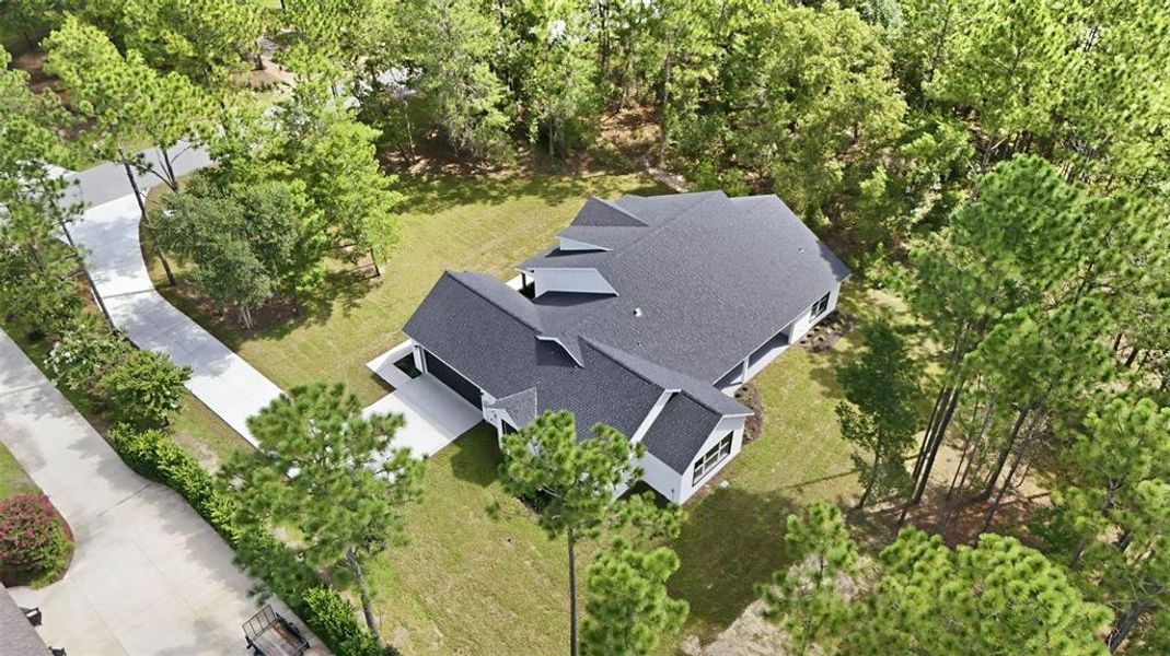 Front exterior of a new home in , Wildwood, FL, highlighting curb appeal (Image 24).