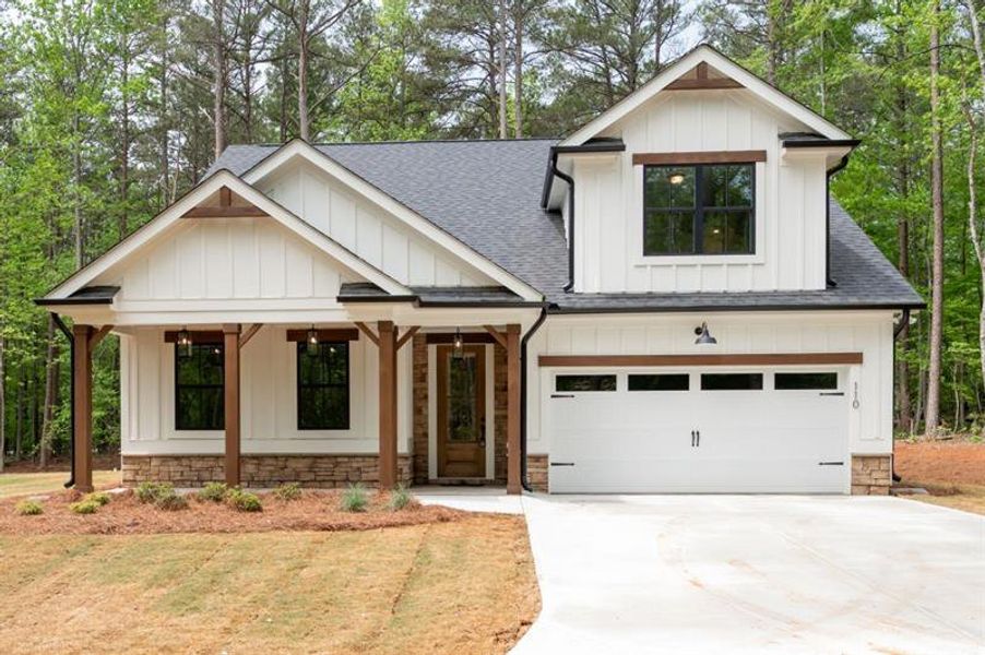 Front exterior of a new home in , Dallas, GA, highlighting curb appeal (Image 19).