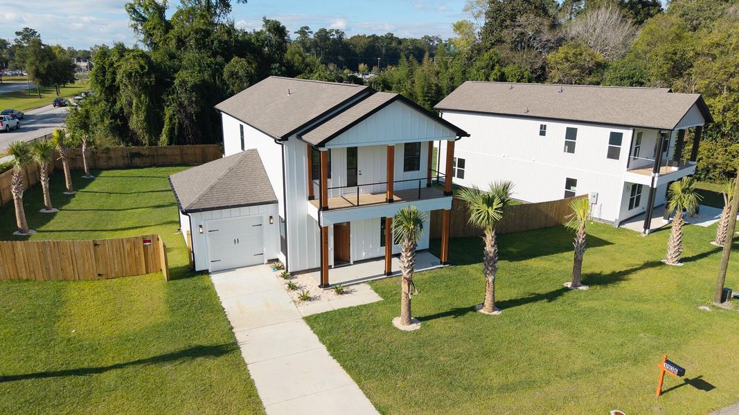 Front exterior of a new home in , North Charleston, SC, highlighting curb appeal (Image 31).