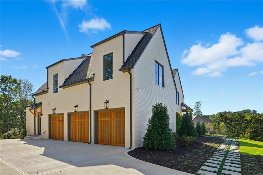 Front exterior of a new home in , Roswell, GA, highlighting curb appeal (Image 2). Front exterior of a new home in , Roswell, GA, highlighting curb appeal (Image 2).