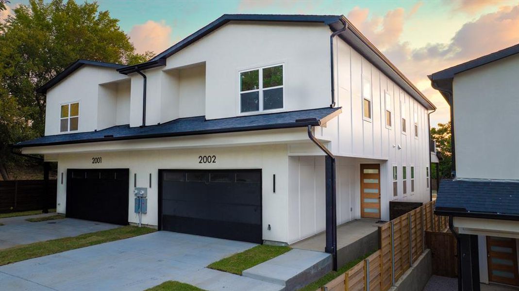 Front exterior of a new home in , Dallas, TX, highlighting curb appeal (Image 22).