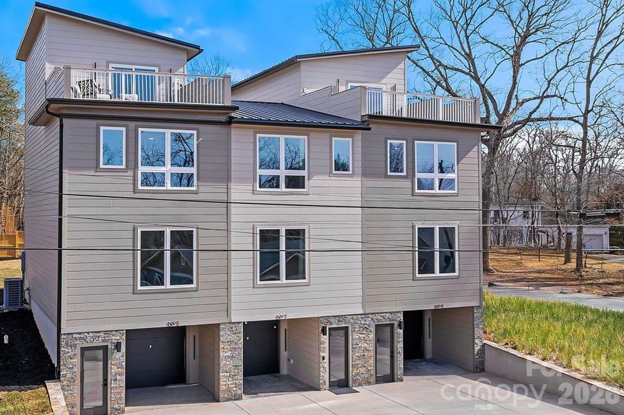 Front exterior of a new home in , Asheville, NC, highlighting curb appeal (Image 2). Front exterior of a new home in , Asheville, NC, highlighting curb appeal (Image 2).