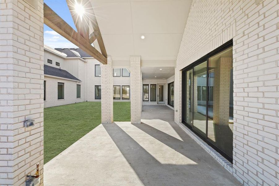 Exterior details and patio area of a home in Dean Farms, Lucas (Image 16).
