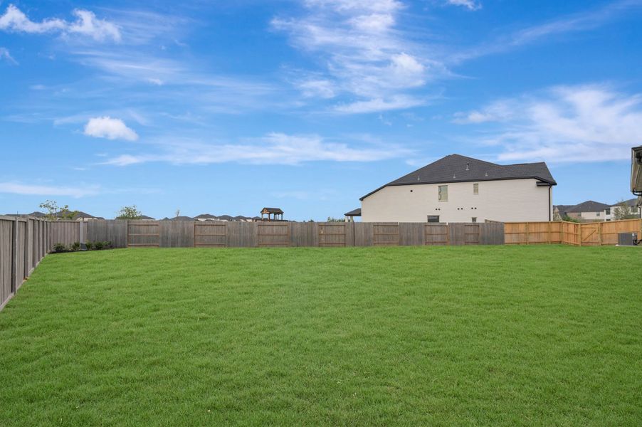 Exterior details and patio area of a home in The Grand Prairie - Retreat Collection, Hockley (Image 4).